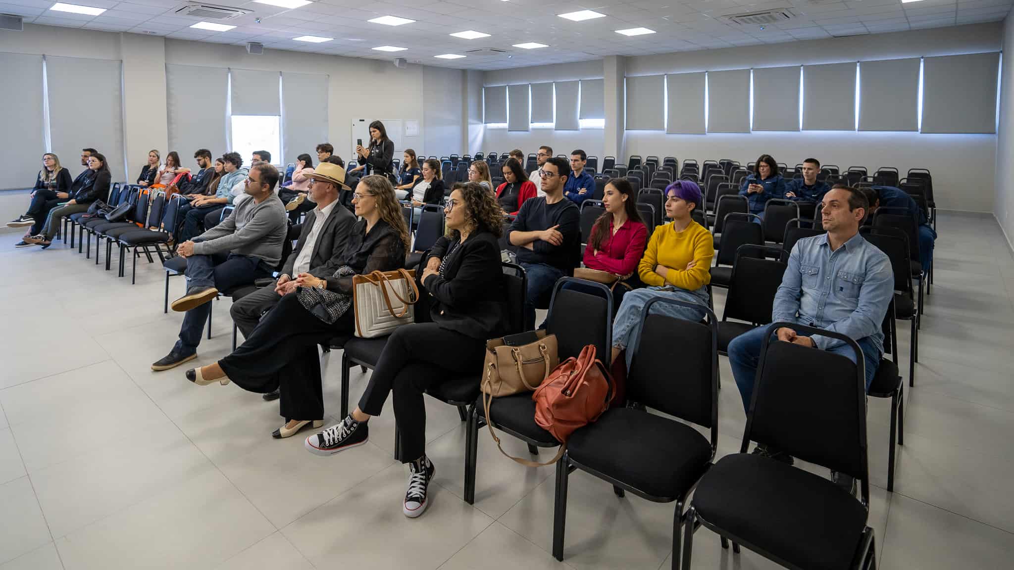 Participantes do evento de resultados do PIUE.